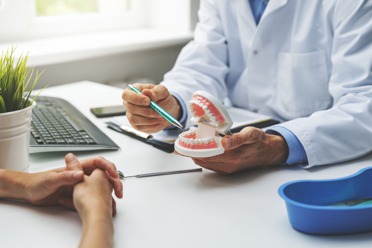 patient meeting with dentist