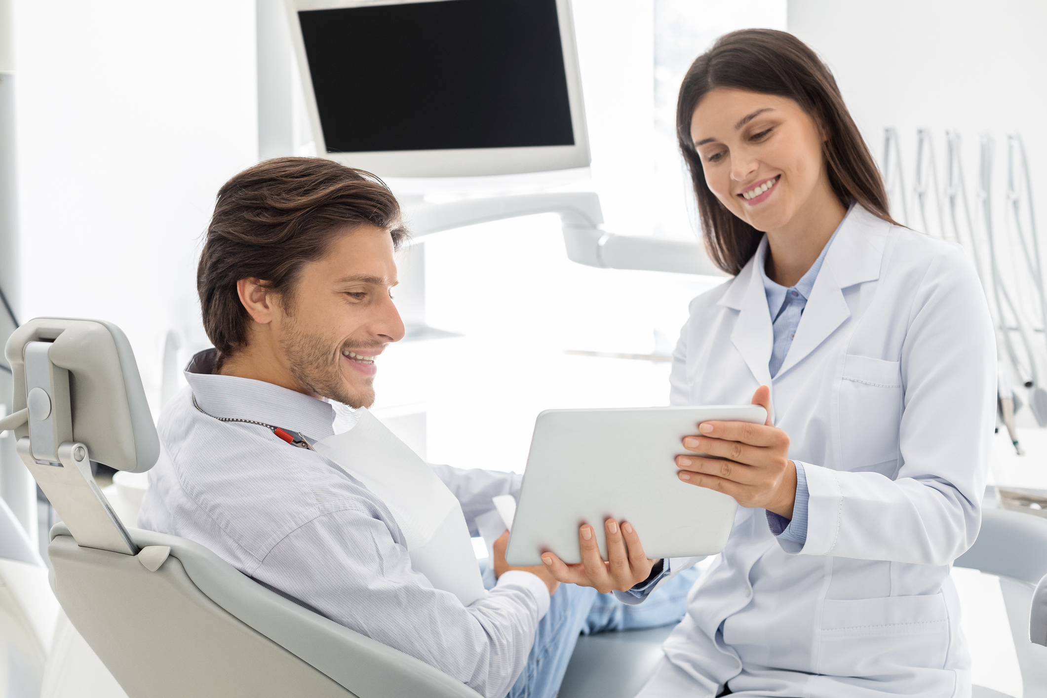 female dentist and patient